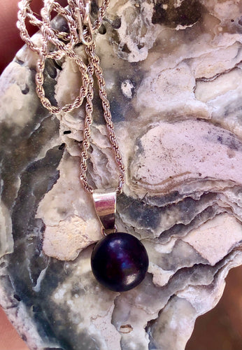 Pérola negra → mistério, transformação e força interior.