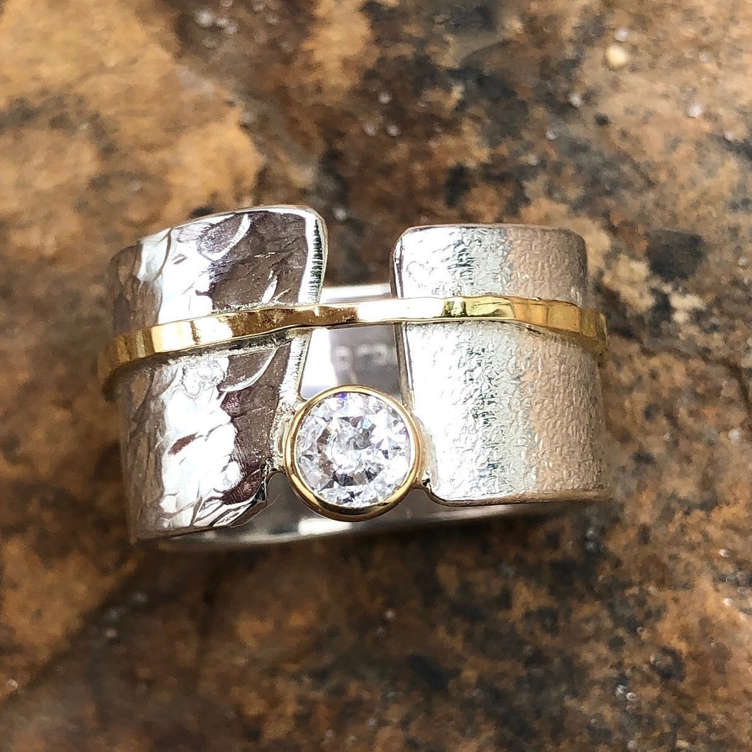 Anel em prata 950, Ouro18K amarelo e Diamante.