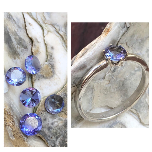 Anel de Prata 950, cravaçāo em Ouro18K amarelo. Gema: Tanzanita.