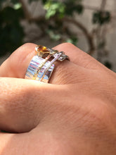 Anel de Prata 950, Ouro18K e Safira amarela.